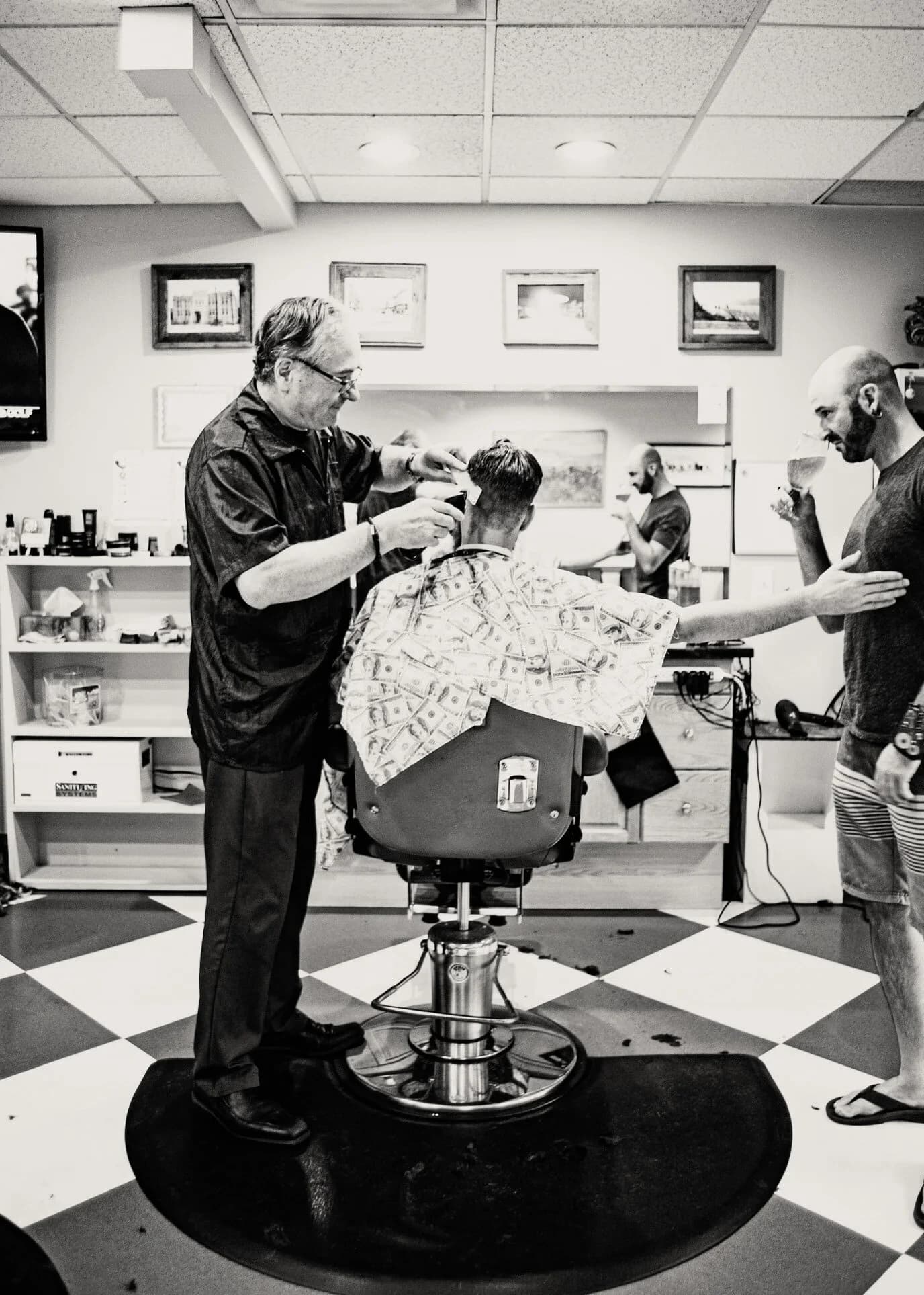 Ferenc Geber inside Rooster’s Barbershop